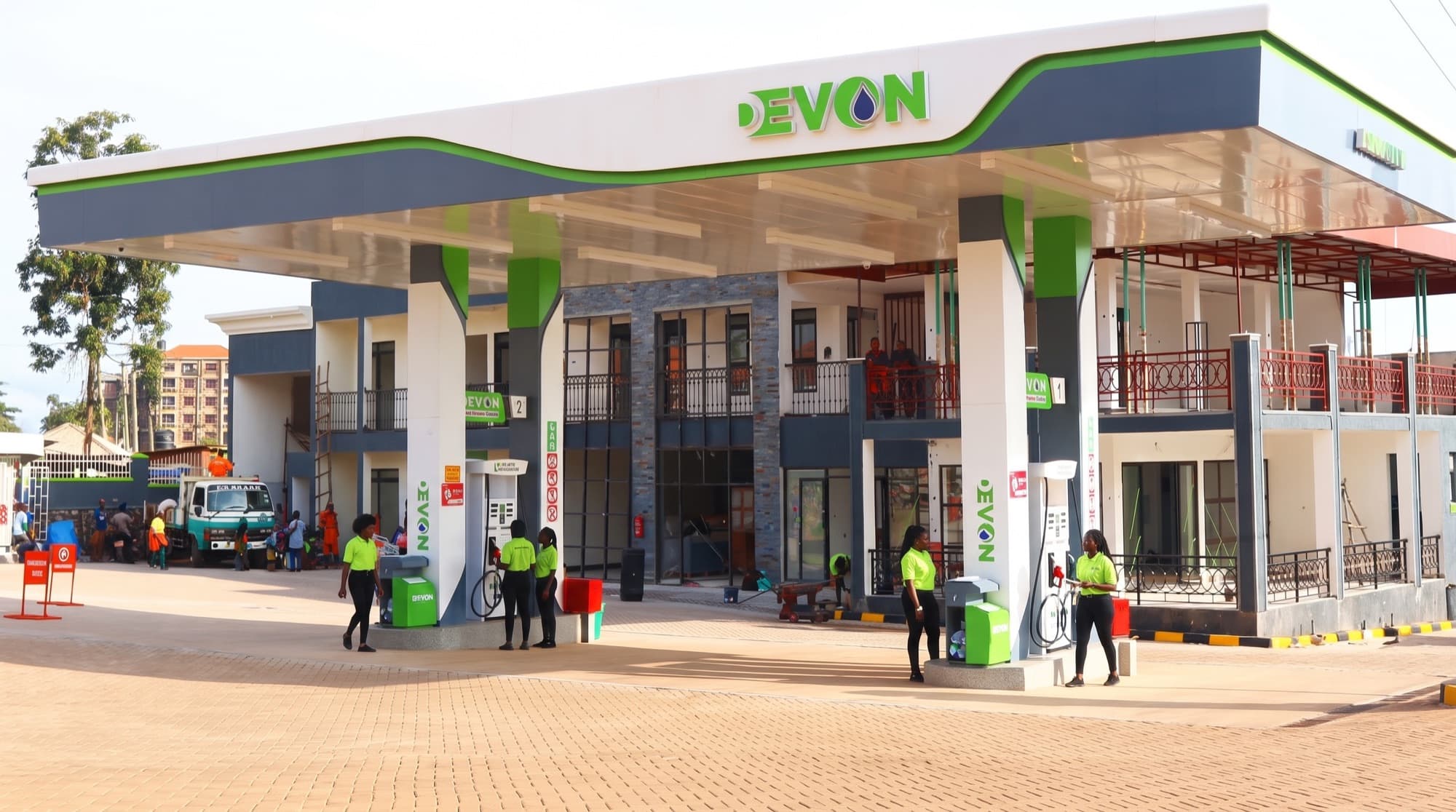 Wide view of a Devon Petroleum service station and canopy